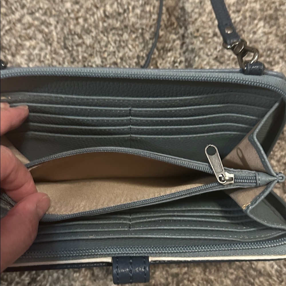 The Sak Iris crossbody wallet in dusty blue leather with navy and ivory trim. - Picture 8 of 9